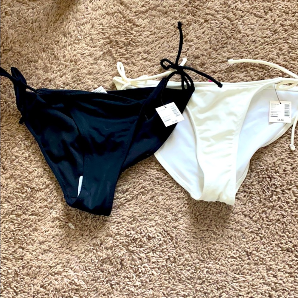 Black and white string bikini bottoms.
